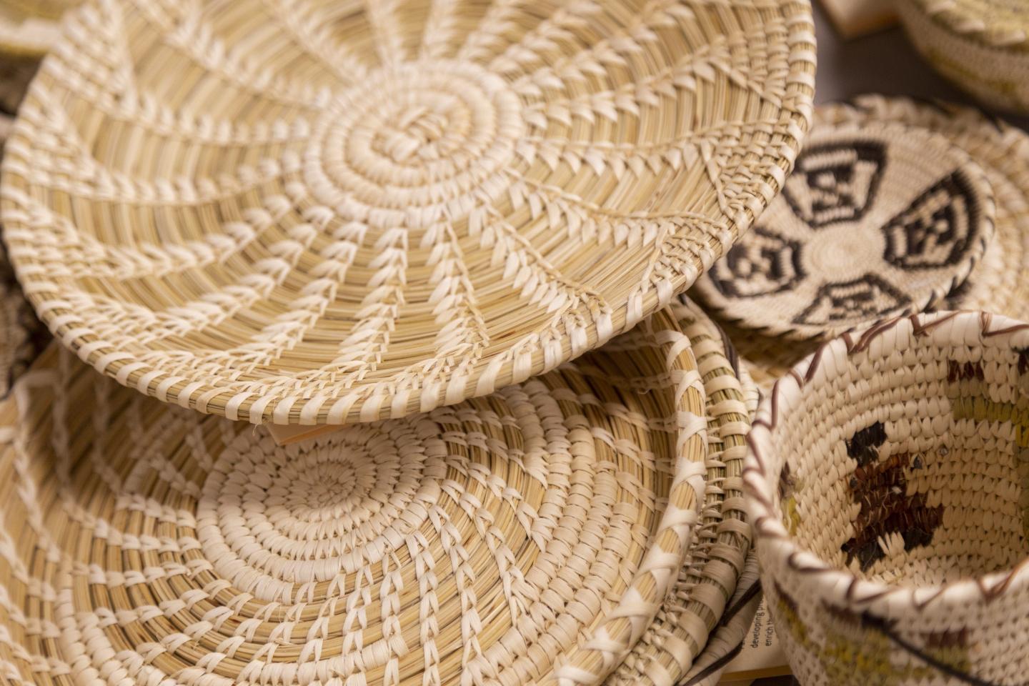Woven baskets with intricate patterns and natural colors.