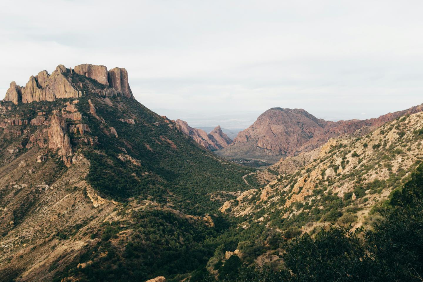 Rocky mountain landscape with a cloudy sky.